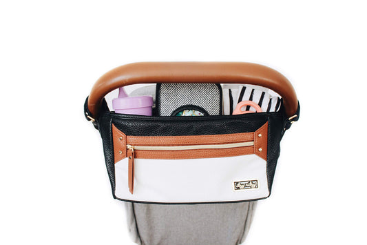 Itzy Ritzy Adjustable Stroller Caddy/Organizer - Stroller Organizer Bag Featuring Front Zippered Pocket, 2 Built-In Interior Pockets & Adjustable Straps to Fit Nearly Any Stroller (Coffee and Cream)