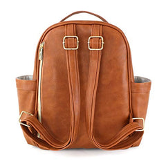 Itzy Ritzy Mini Diaper Bag Backpack & Chic Mini Diaper Bag Backpack with Vegan Leather Changing Pad, 8 Total Pockets (4 Internal and 4 External), Grab-Top Handle and Rubber Feet, Cognac